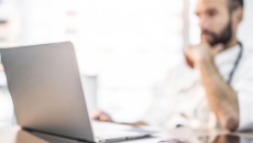   Healthcare provider on a computer