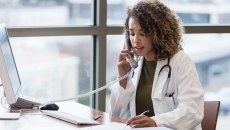 Healthcare professional talking to someone on the phone