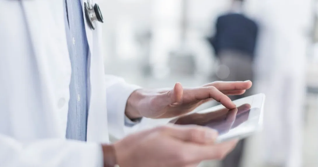 Healthcare provider on a tablet