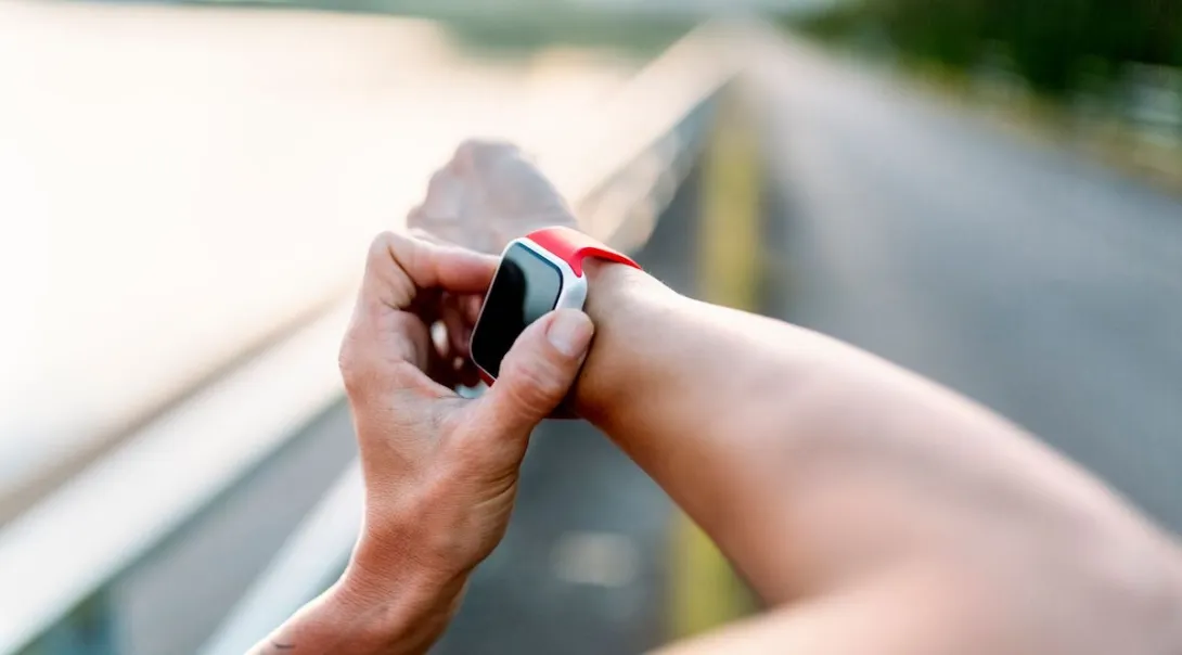 
  A close-up of a person wearing a smartwatch.

