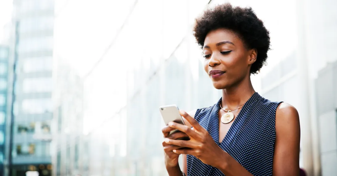 
  A person using a smartphone.
