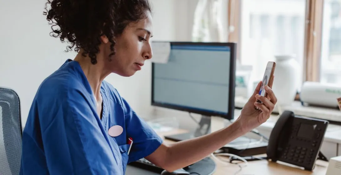 A telemedicine visit via smartphone.